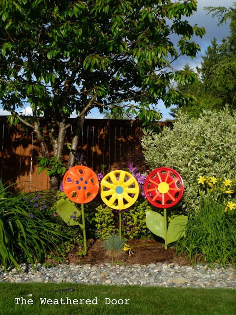 Hubcap Flower Yard Art