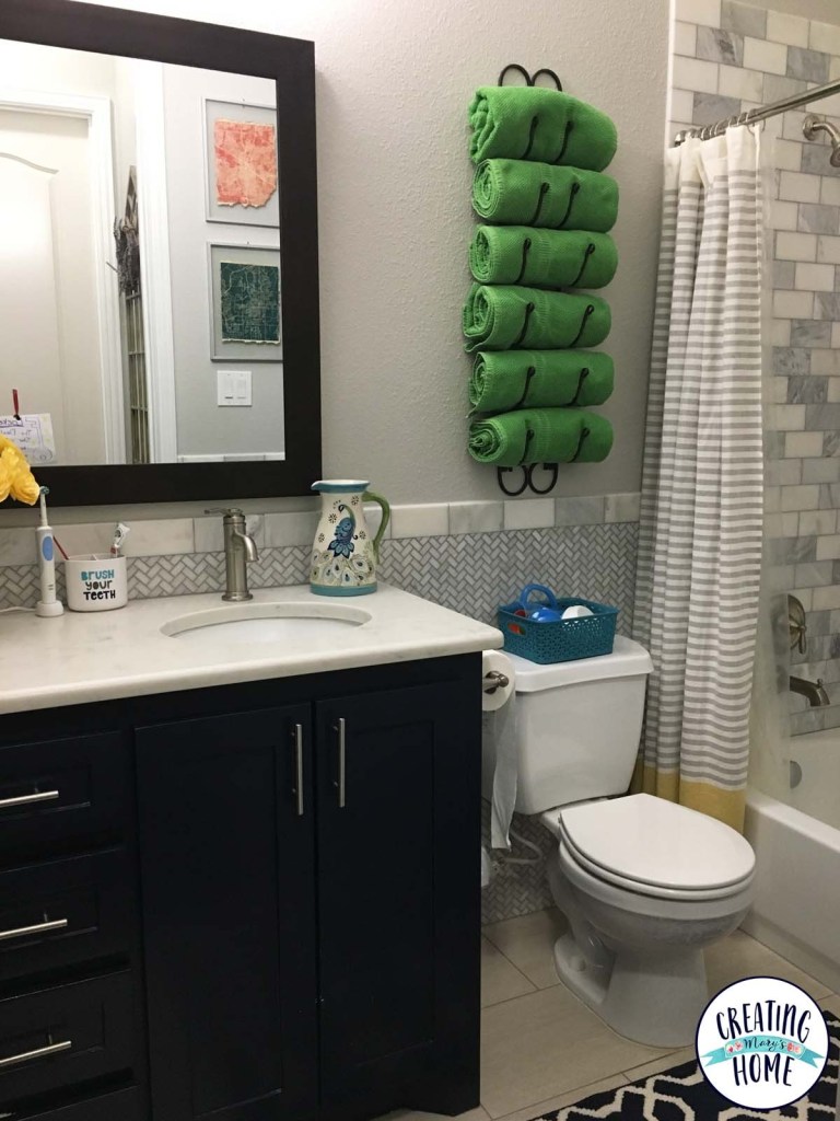 Use a wine rack in your bathroom to hold towels
